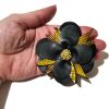 Fekete-mustársárga virágos bross kitűző